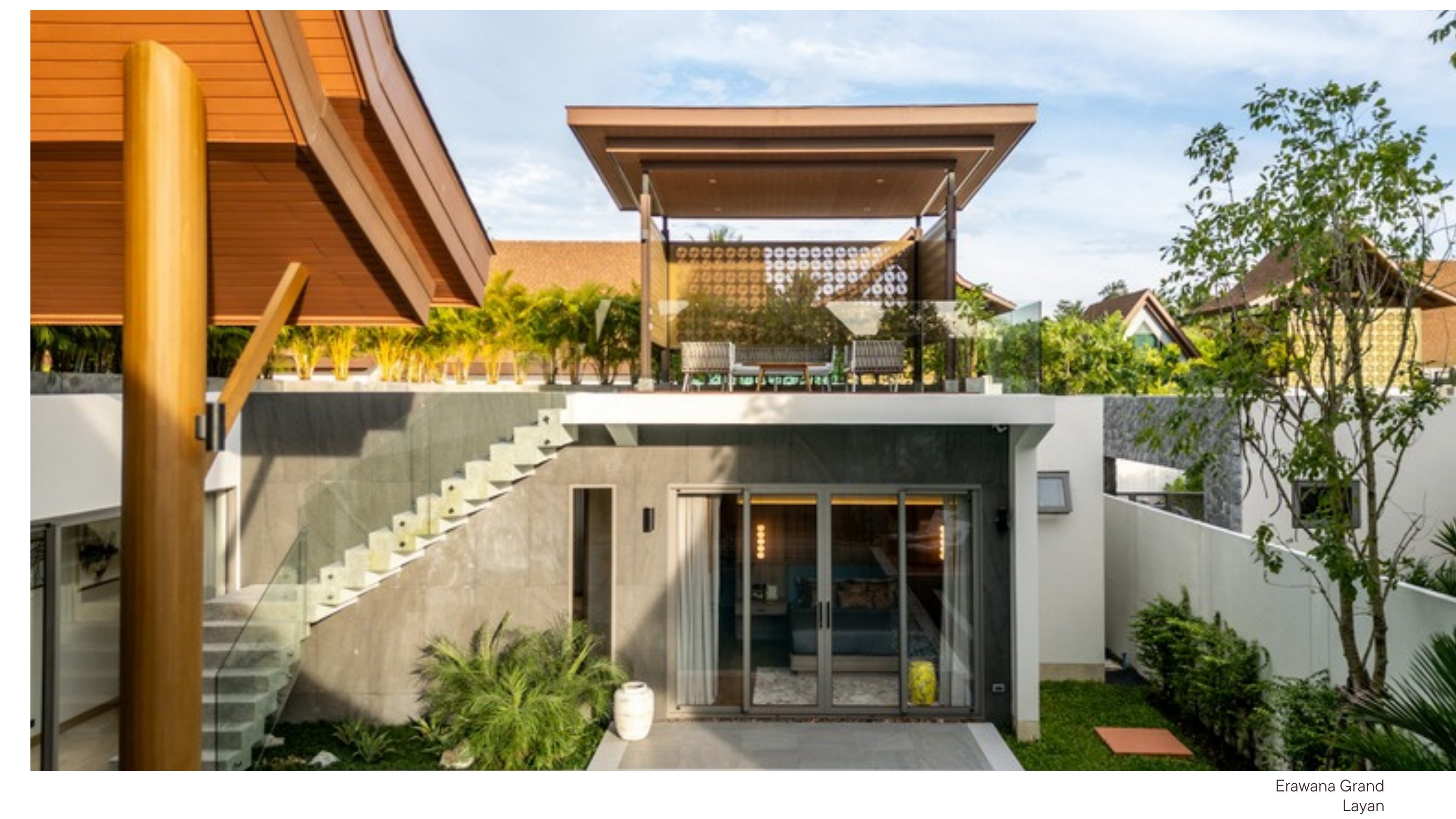 Erawana Grand villa entrance with timber pergola and natural stone facade